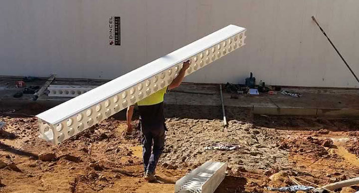 Man lifting lightweight Dincel profile one handed