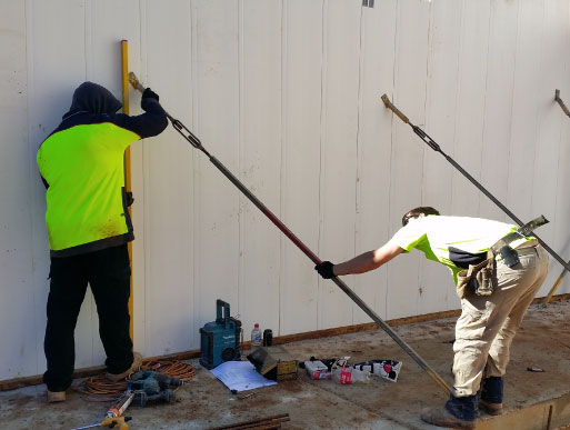 Man lifting lightweight Dincel profile one handed